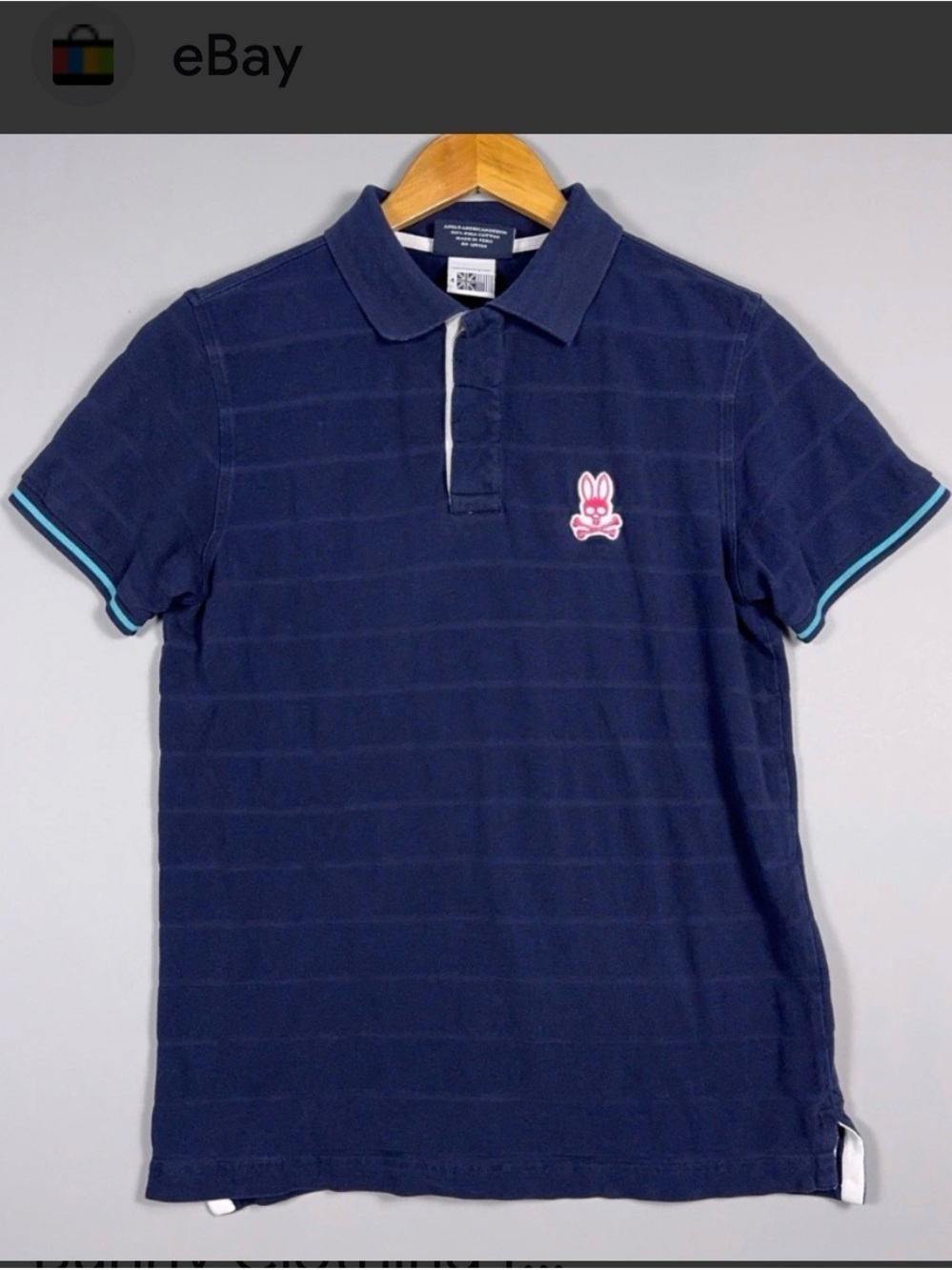 Psycho Bunny Navy Polo with Turquoise Trim and Large Pink and White Logo